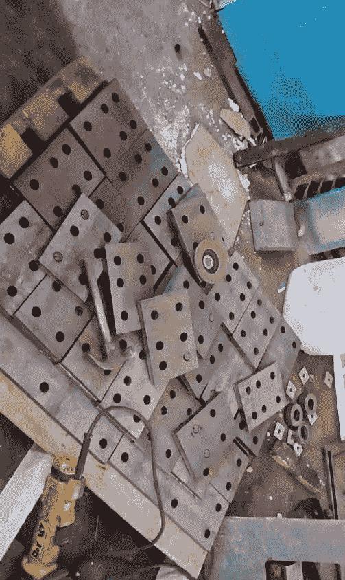 Precision-cut metal plates with holes